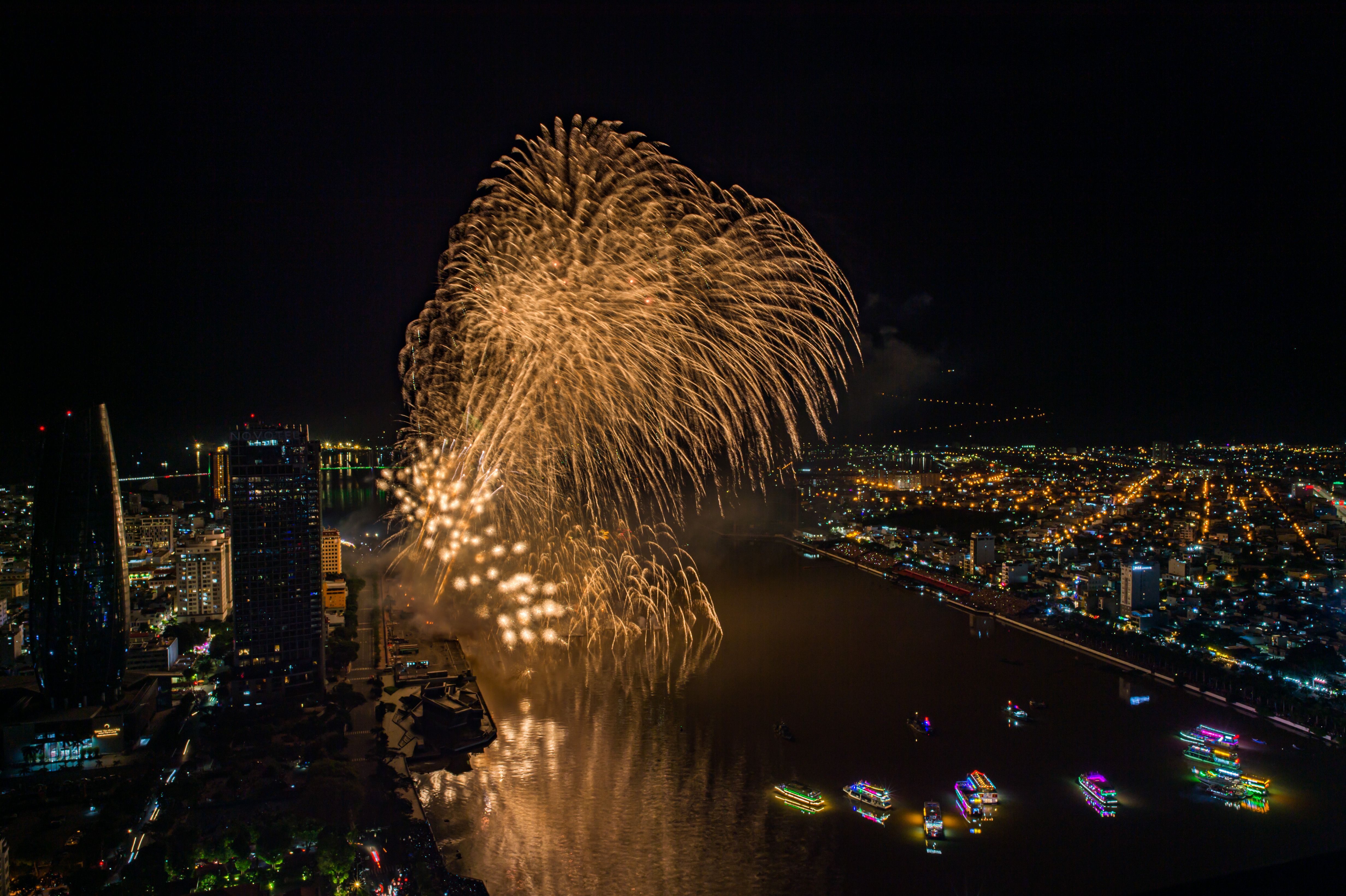 Spectacular Nighttime Fireworks Display Over City · Free Stock Photo
