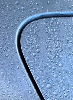 Detailed macro shot of raindrops on a smooth metal surface with a modern abstract feel.