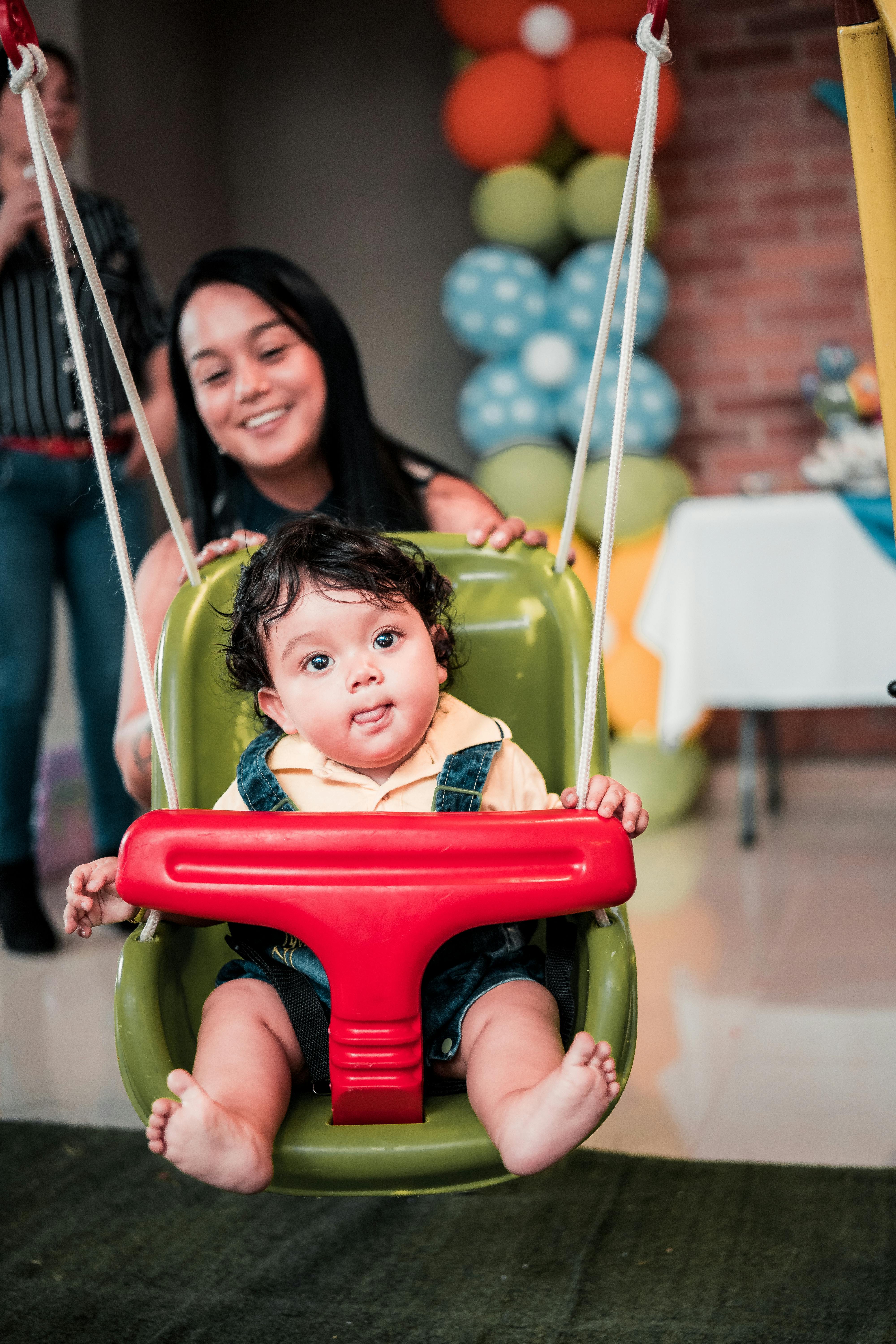 Kid Sitting in Swing