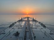 Tanker Ship at Sunrise in Calm Ocean Waters