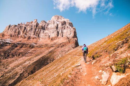 Photo of Person Hiking During Daytime