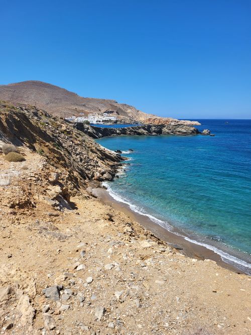 Free Breathtaking view of the rocky coastline and clear blue waters of Folegandros Island. Stock Photo