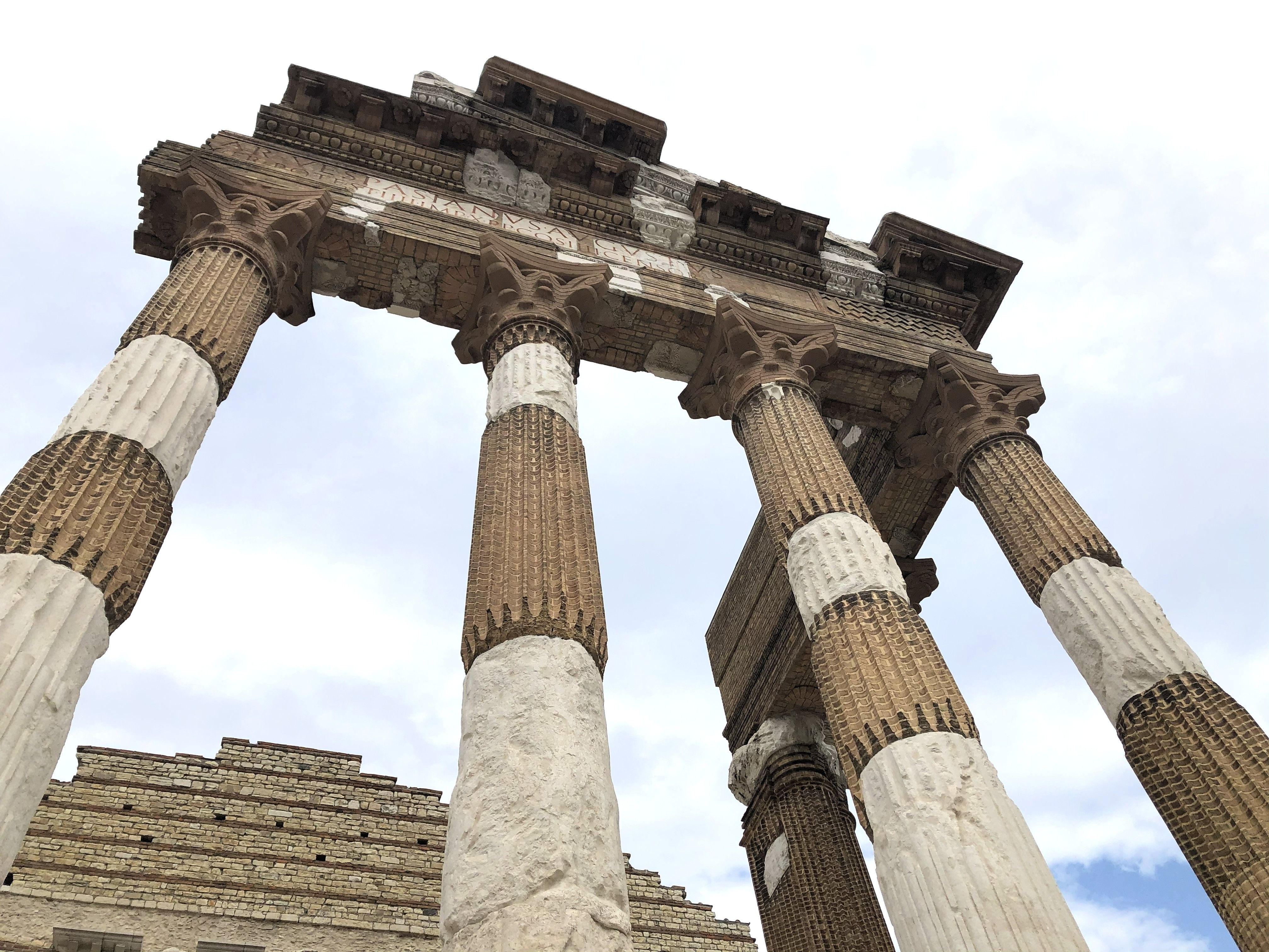 Ancient Roman Temple Columns Against Sky · Free Stock Photo