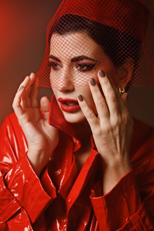 Elegant Woman in Red Veil and Coat Portrait · Free Stock Photo
