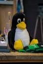Colorful Workspace with Penguin Plush Toy
