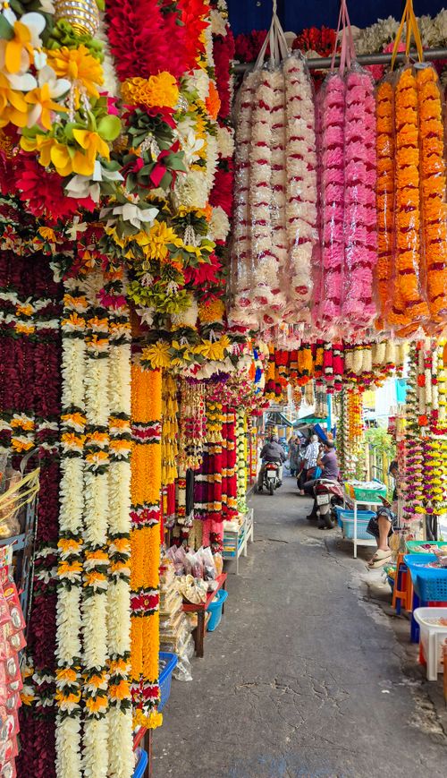 Free Explore the vibrant and colorful flower market street in Bangkok, Thailand, bursting with floral arrangements. Stock Photo