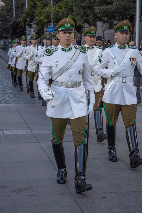 Free Chilean Carabinieri in ceremonial dress parade the streets of Santiago. Stock Photo