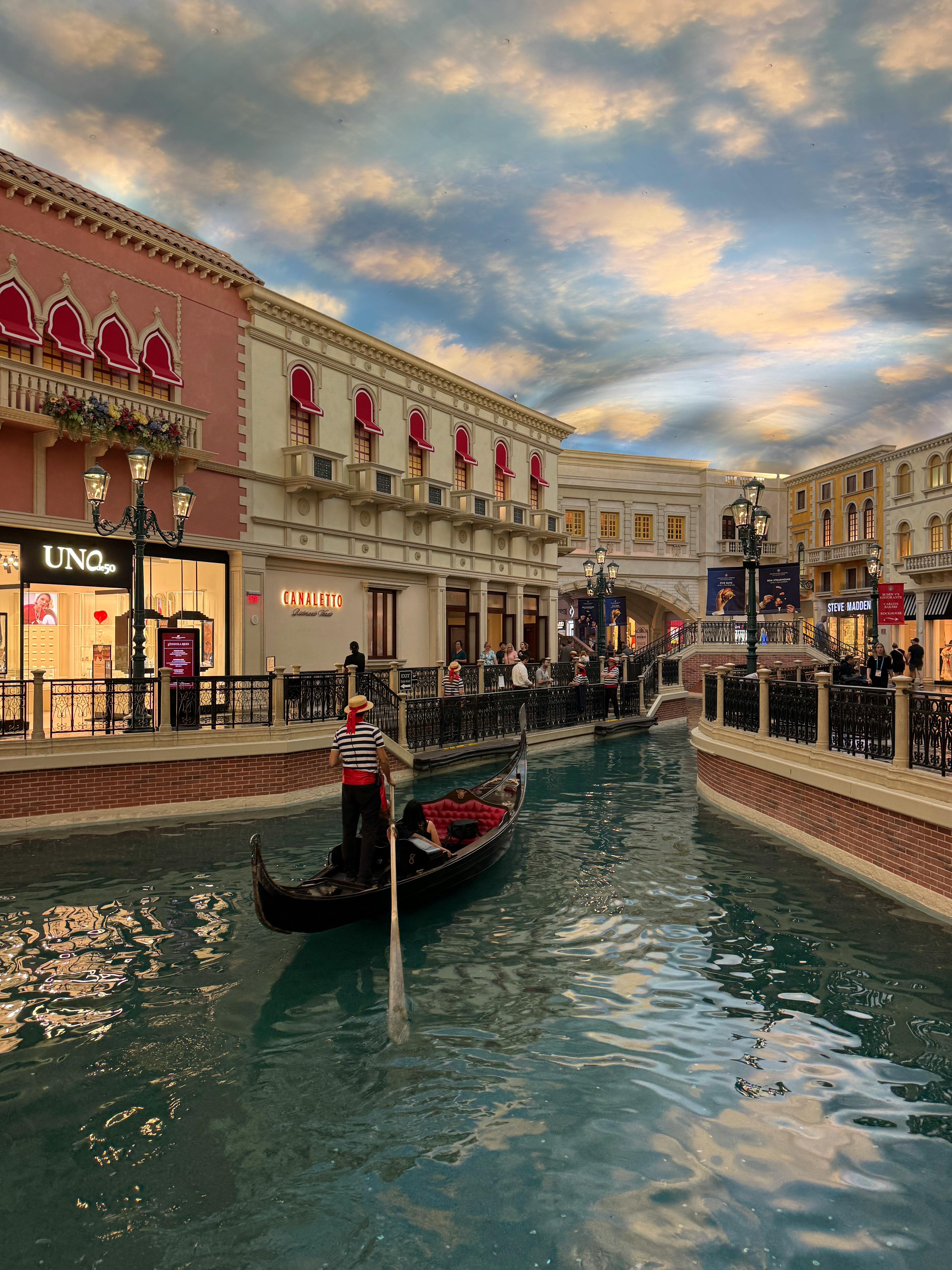 Canal inside The Shoppes at Marina Bay Sands with gondola boats