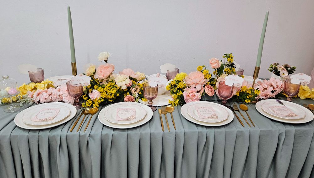 Pastel floral event table with gold details