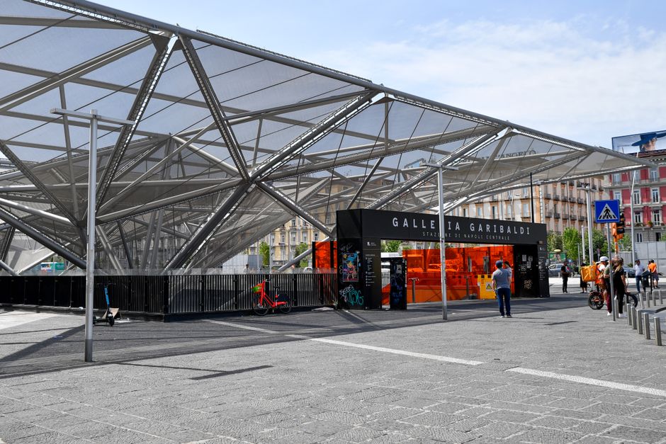 Explore urban life at Galleria Garibaldi, a bustling hub in Napoli, Italy.