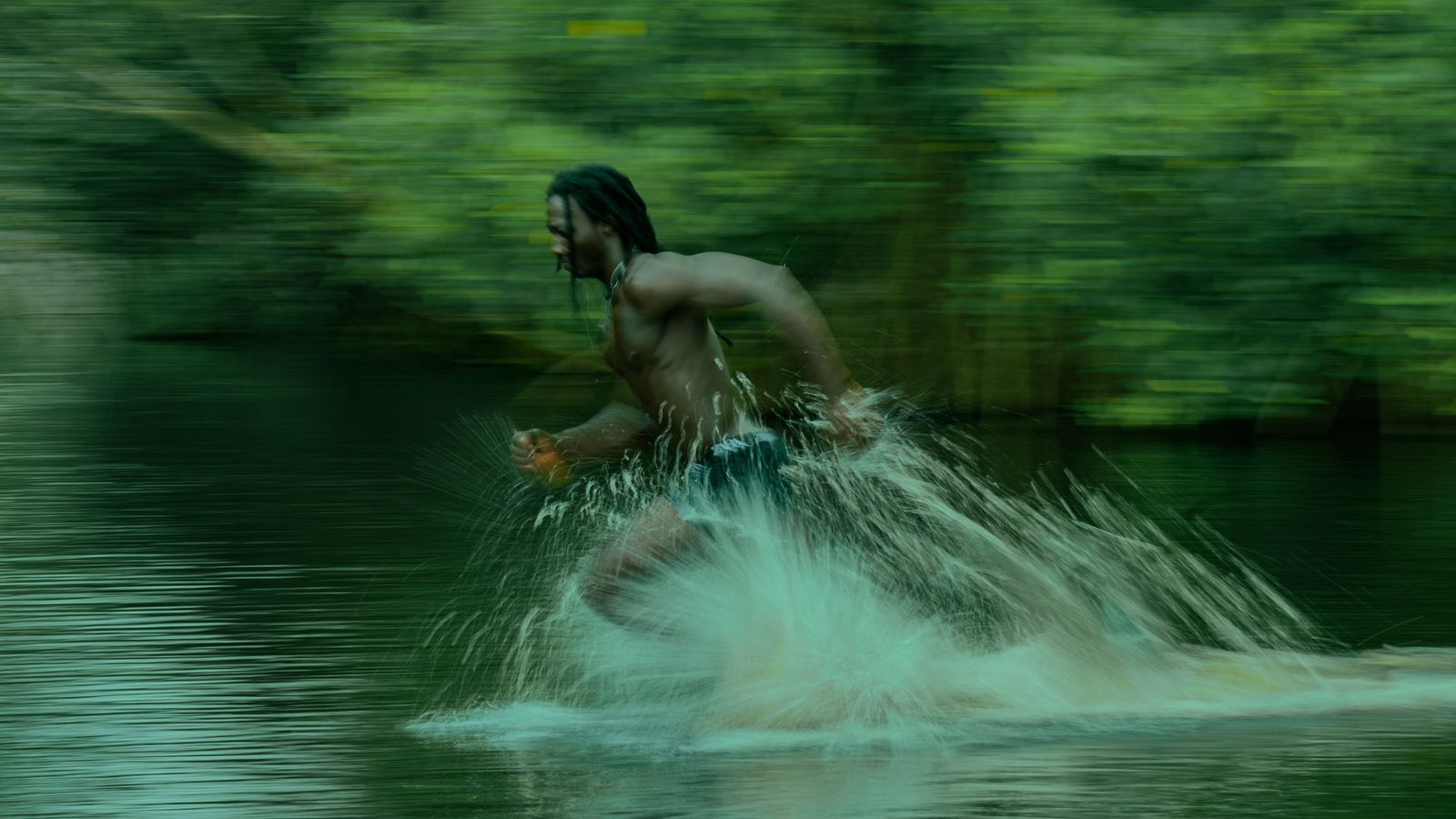Dynamic motion of a man running on water in takoradi, Guinea-Bissau