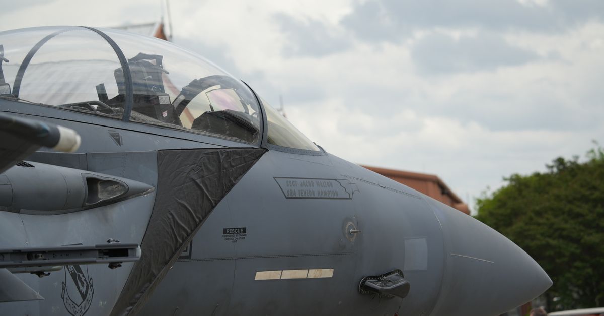 Detailed view of a fighter jet cockpit at an outdoor air show in Hampton, Virginia.