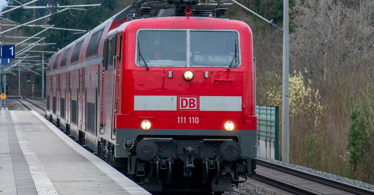 Red Train Network Box Red Train Approaching Rural Train Station Platform · Free Stock Photo