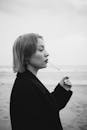 Black and White Portrait of a Woman by the Sea