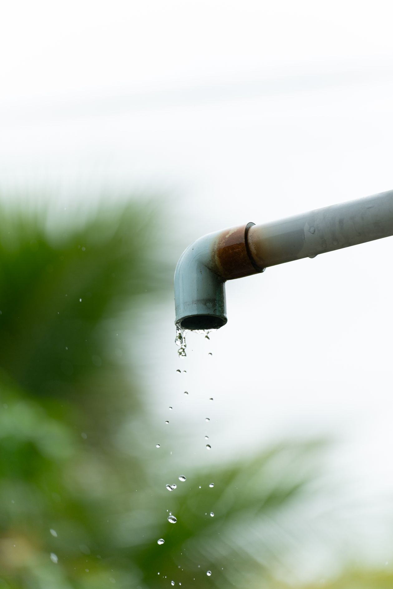Water dripping from an outdoor pipe