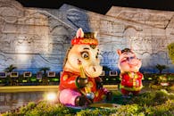 Colorful Cultural Statues at Night in Park