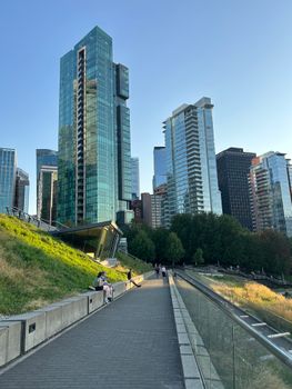 A peaceful view of modern skyscrapers in Vancouver, showcasing urban architecture under clear skies.