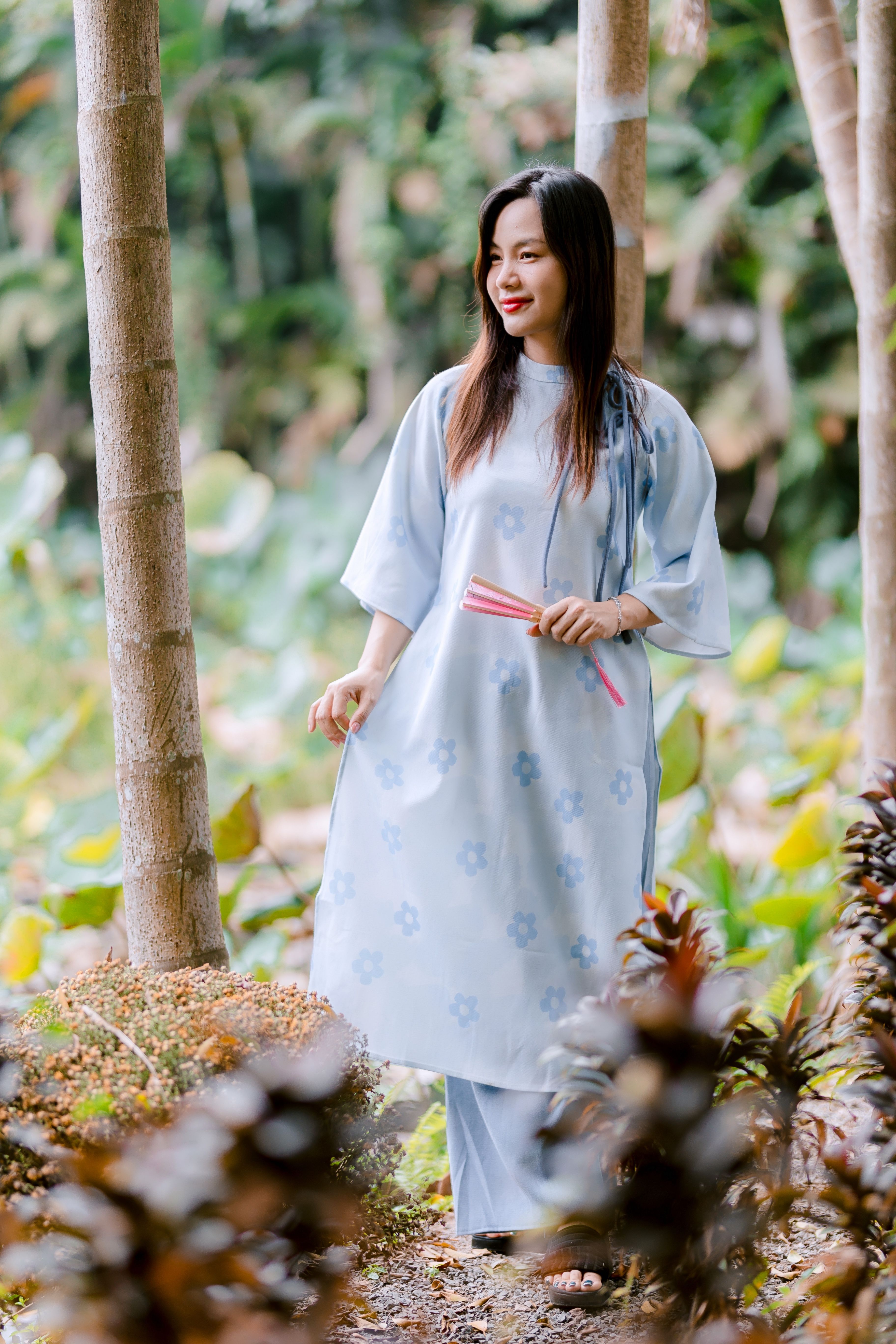 Elegant Woman in Traditional Dress Outdoors · Free Stock Photo