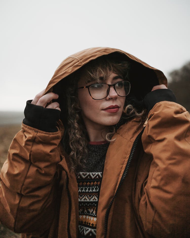 Photo Of Woman Wearing Brown Jacket