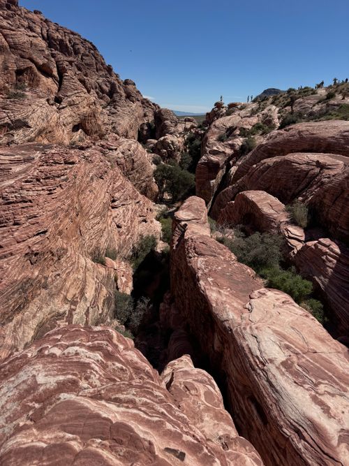 Free Explore the breathtaking geological formations of Red Rock Canyon, Nevada, under a clear blue sky. Stock Photo