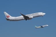 Japan Airlines and Air Do Planes in Flight