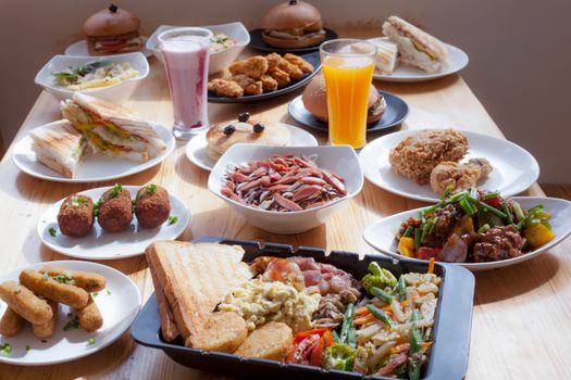 An assortment of appetizing dishes on a table, perfect for a food variety theme.
