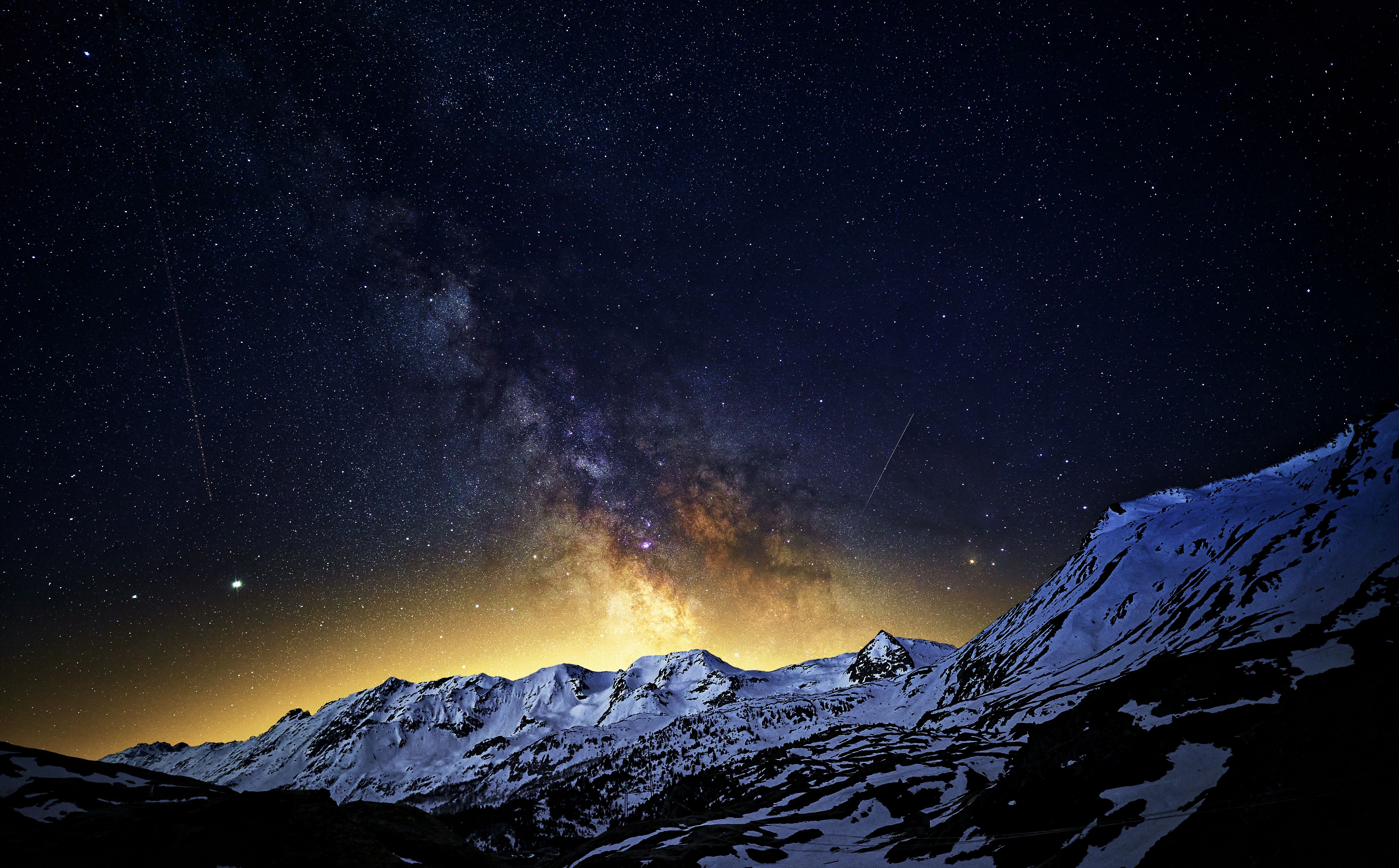 Stunning Night Sky Over Snowy Mountain Range · Free Stock Photo