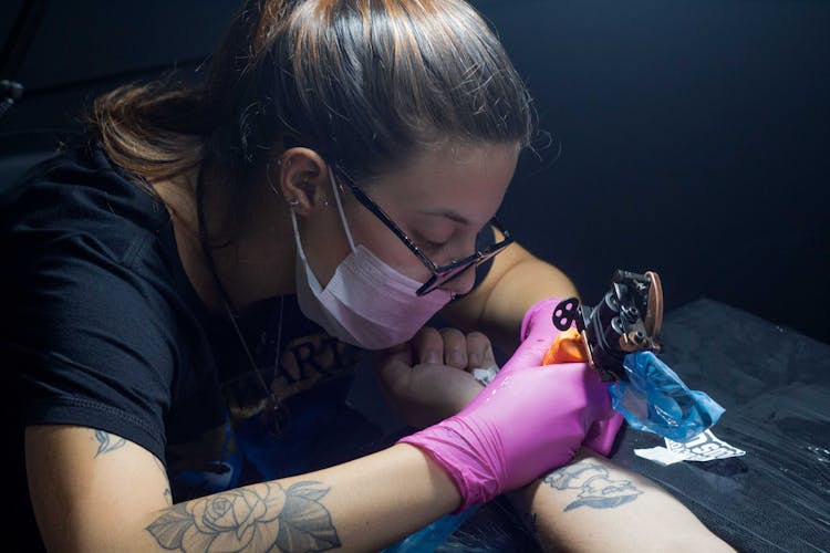 Close Up Photo Of A Tattoo Artist