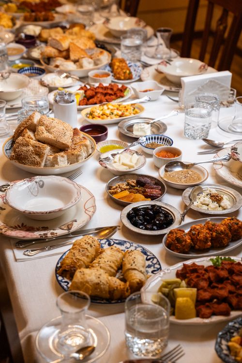 Free A richly set dining table with a variety of Turkish dishes, perfect for celebrations. Stock Photo
