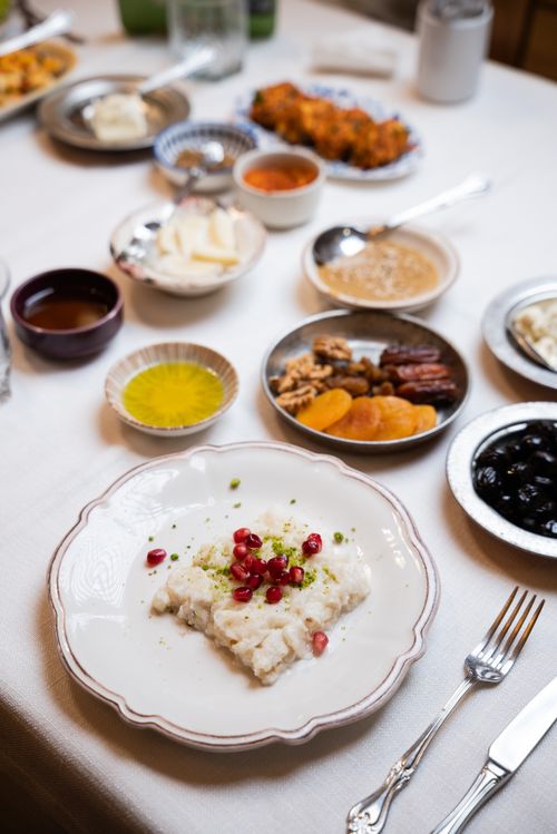 Free A beautifully arranged traditional Turkish meal with diverse dishes on a dining table. Stock Photo