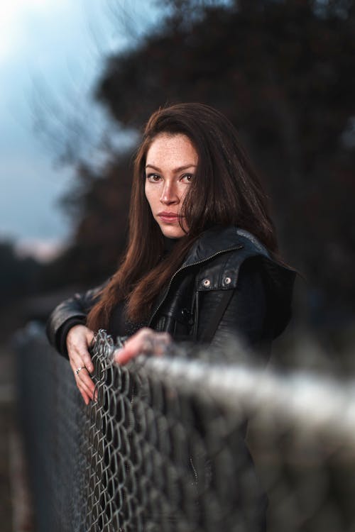 Photo of Woman Wearing Black Leather Jacket