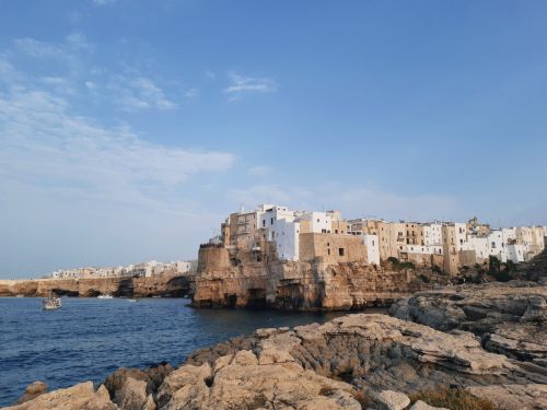 Free Explore the stunning coastal town of Polignano a Mare in Apulia, Italy, known for its dramatic cliffs and whitewashed buildings. Stock Photo