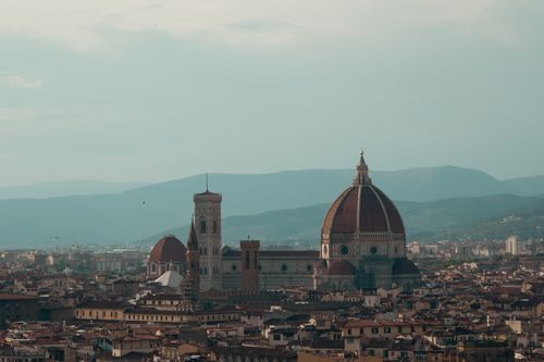 Free Explore the breathtaking aerial view of Florence featuring the iconic Cathedral of Santa Maria del Fiore. Stock Photo