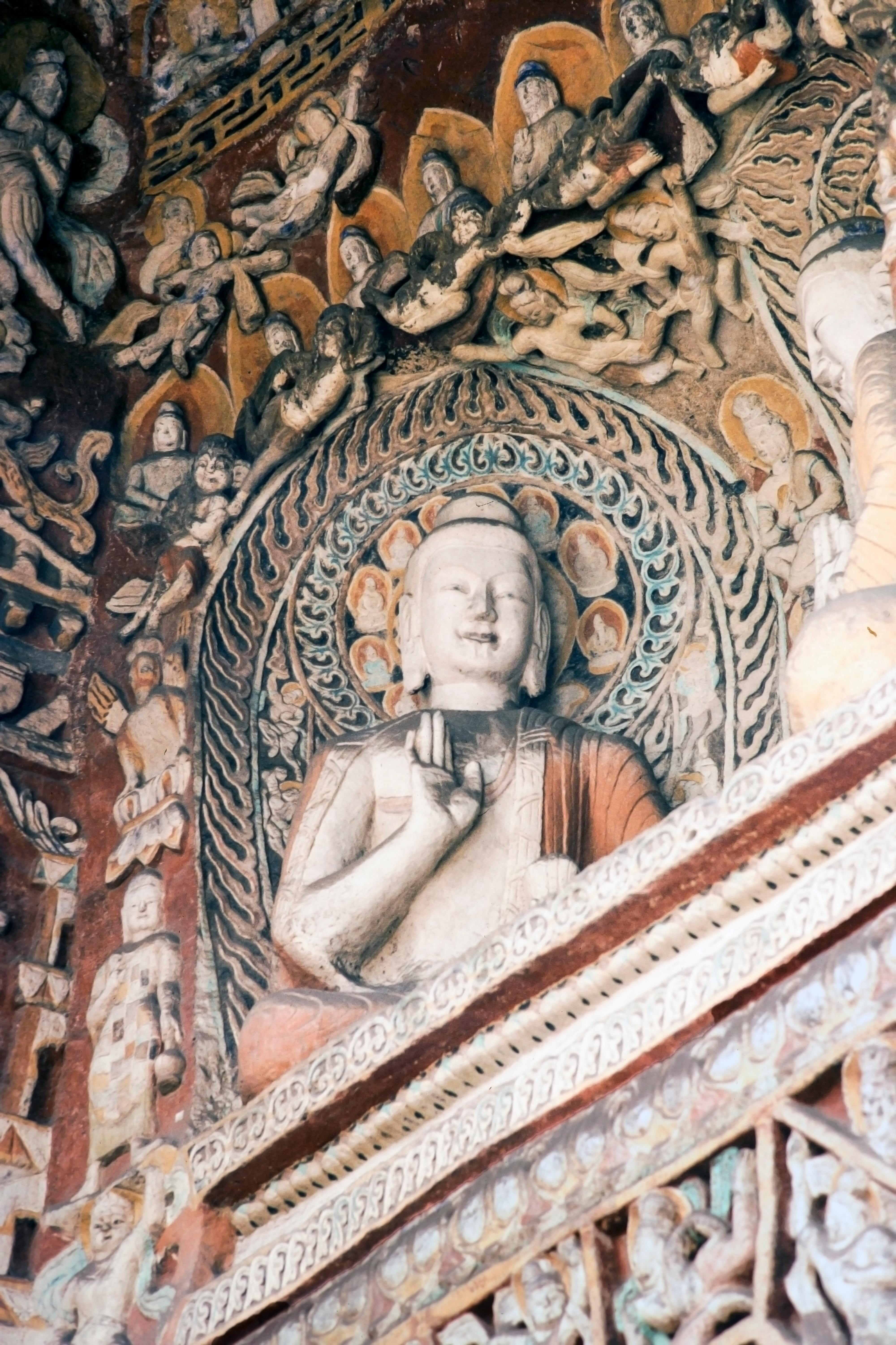 Gratuit Les grottes de Yungang abritent des sculptures en pierre complexes représentant un Bouddha, témoignant du savoir-faire artistique de la Chine ancienne. Photos