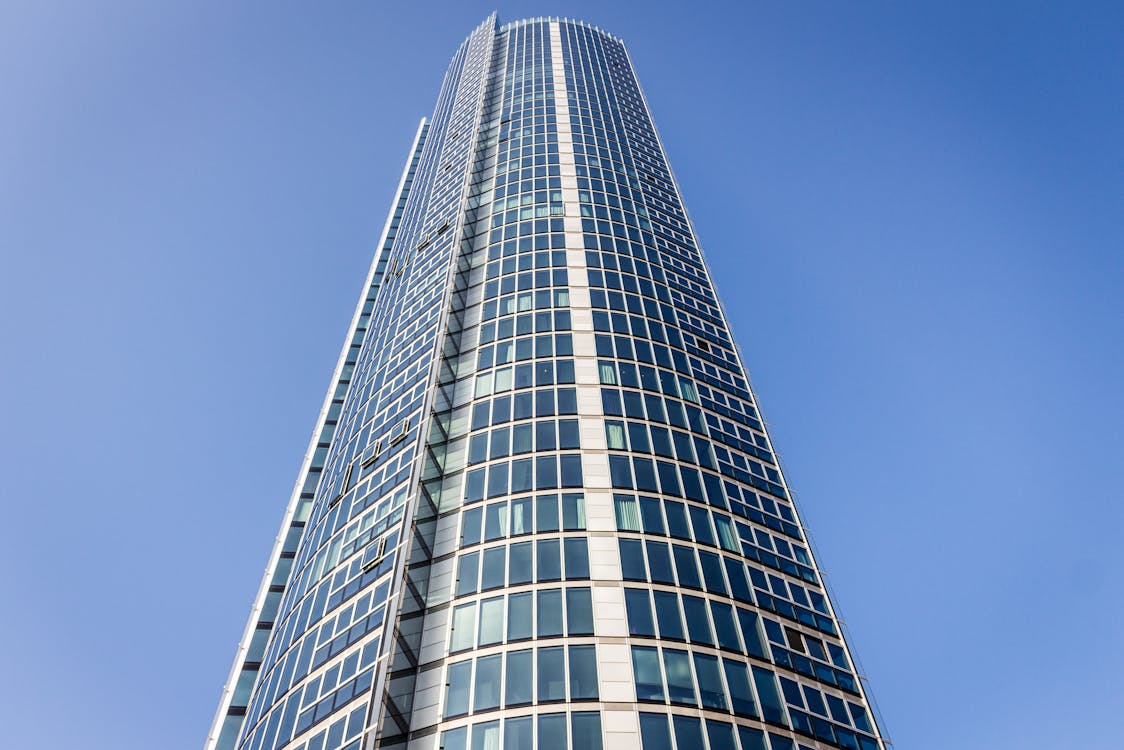 Black and White City Building Under Blue Clear Sky