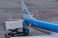 Airplane with Catering Truck at Airport