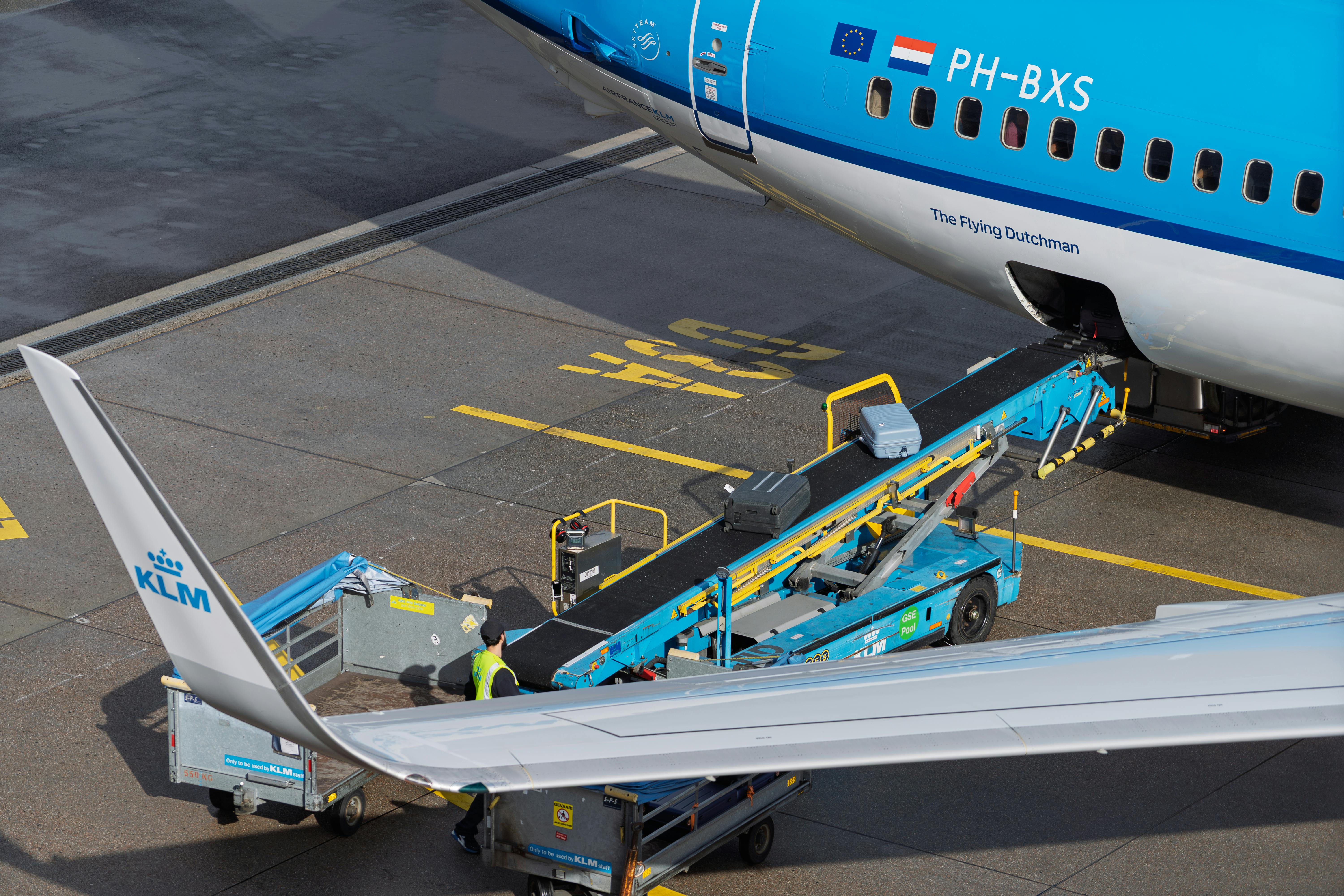 KLM Aircraft on Tarmac with Baggage Loading