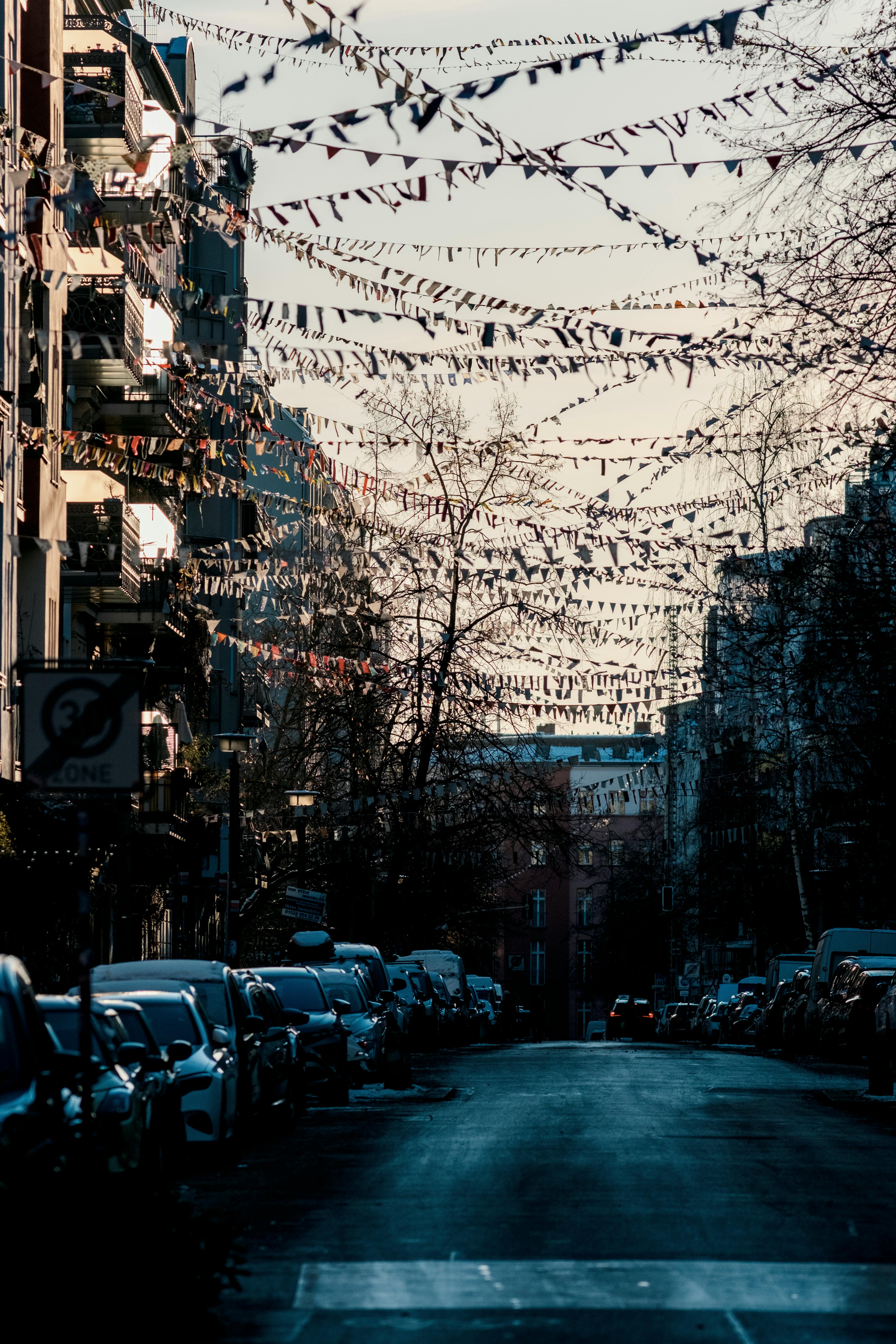 Free Street in Berlin adorned with hanging bunting lines, showcasing an urban winter atmosphere. Stock Photo