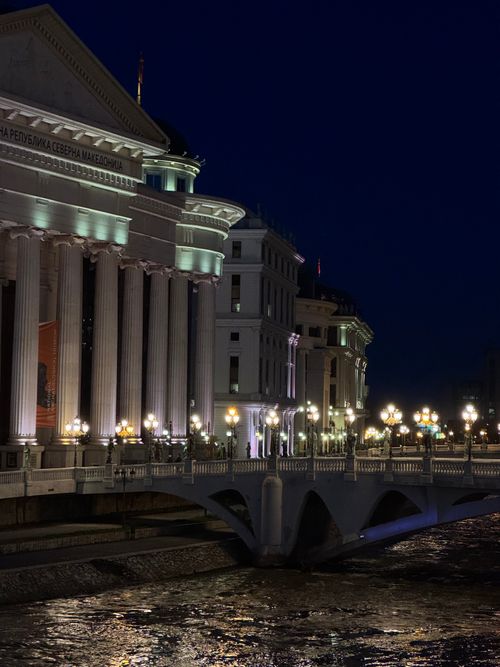 Free Stunning night cityscape of the Stone Bridge and historic buildings in Skopje, Macedonia. Stock Photo
