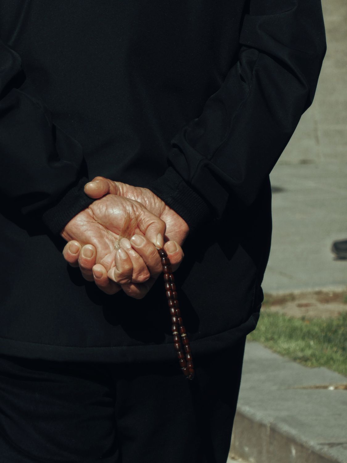 Elderly Man Holding Prayer Beads in İstanbul · Free Stock Photo