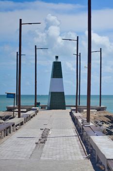 View of the iconic lighthouse in João Pessoa, Paraíba, Brazil, with ocean backdrop.