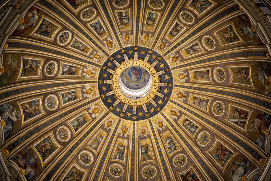 Tour group admiring art inside the Vatican Museums, Rome