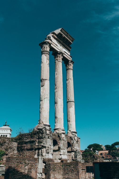 Free Majestic ancient temple ruins stand tall in the Roman Forum, Rome, Italy. Stock Photo
