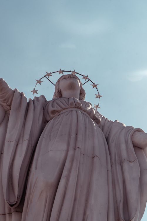 Free Majestic low-angle view of the Virgin Mary statue at Cerro San Cristóbal, highlighting cultural heritage. Stock Photo
