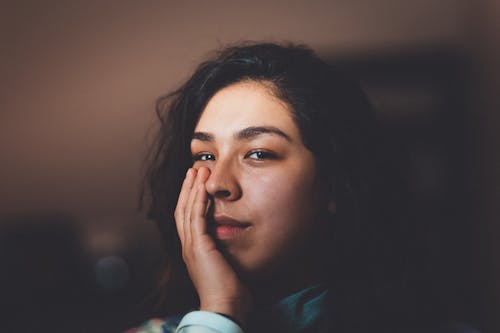 Free Photo of Woman Touching Her Face Stock Photo