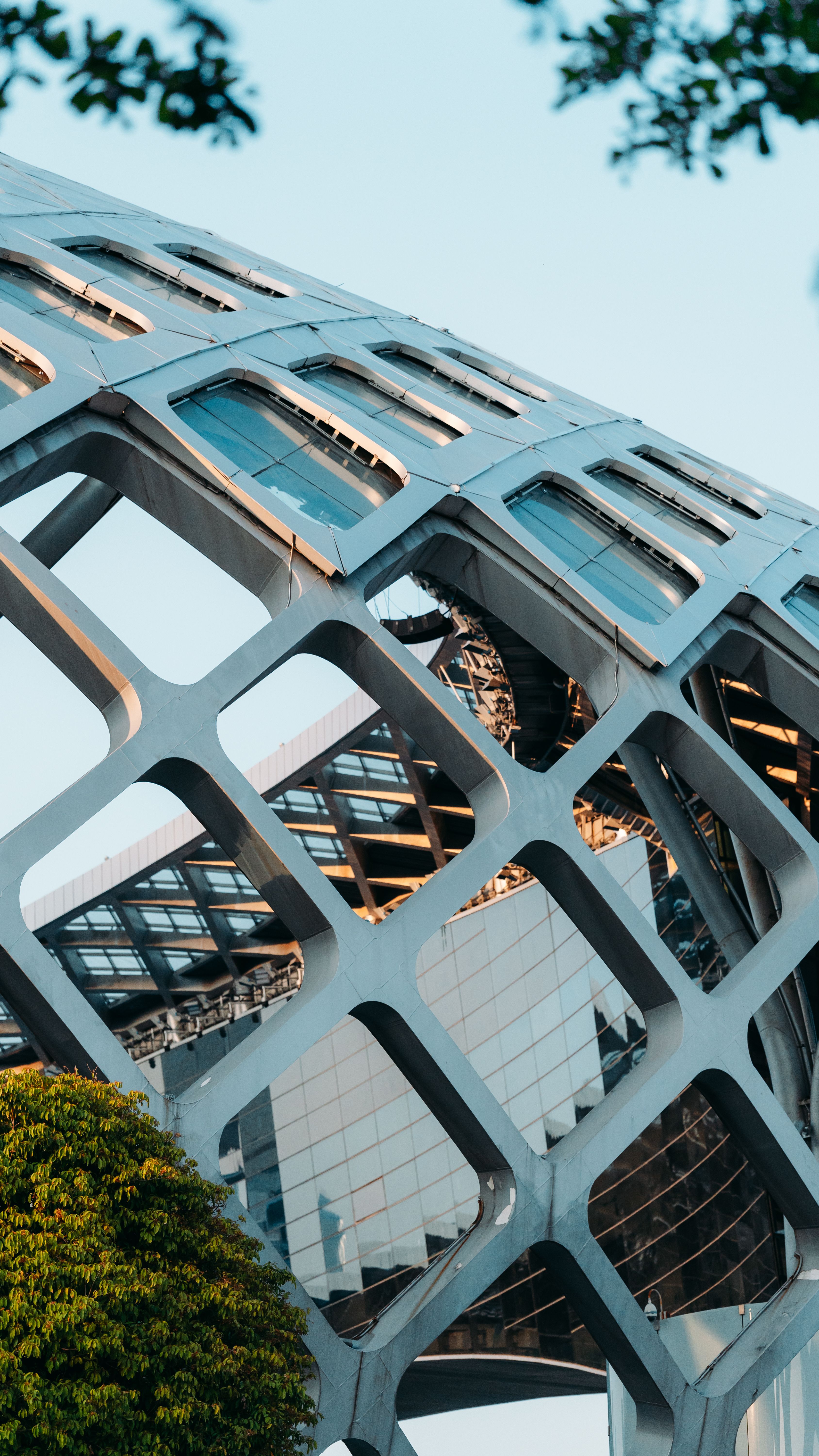 Modern Architectural Grid with Reflective Windows · Free Stock Photo