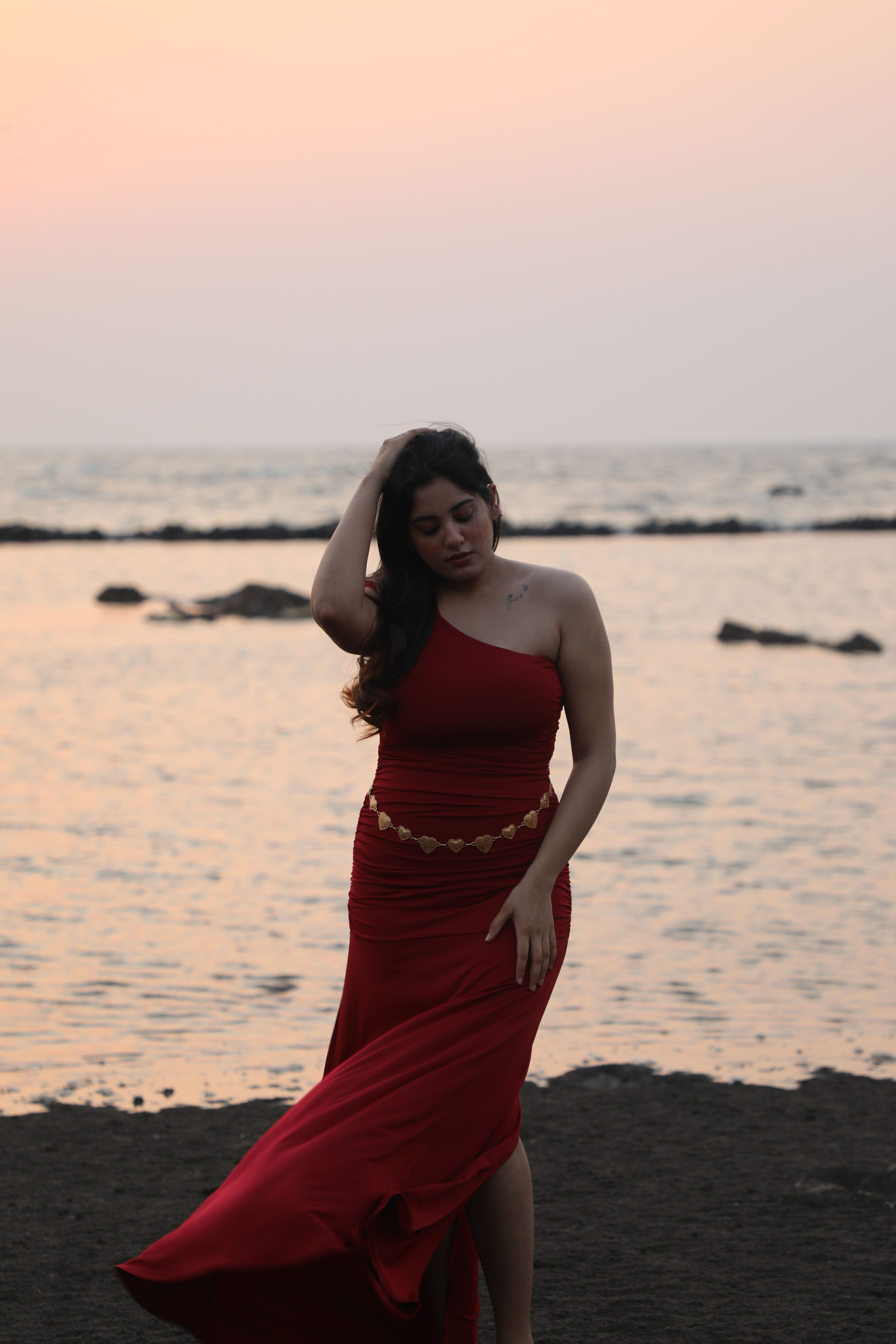 Elegant Woman in Red Dress at Beach Sunset · Free Stock Photo