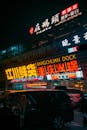 Night Scene of Neon-Lit Street Front in Urban Asia