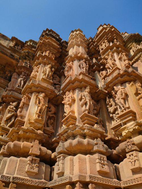 Free Intricate carvings of the Khajuraho temple showcase ancient Indian architecture and artistry. Stock Photo