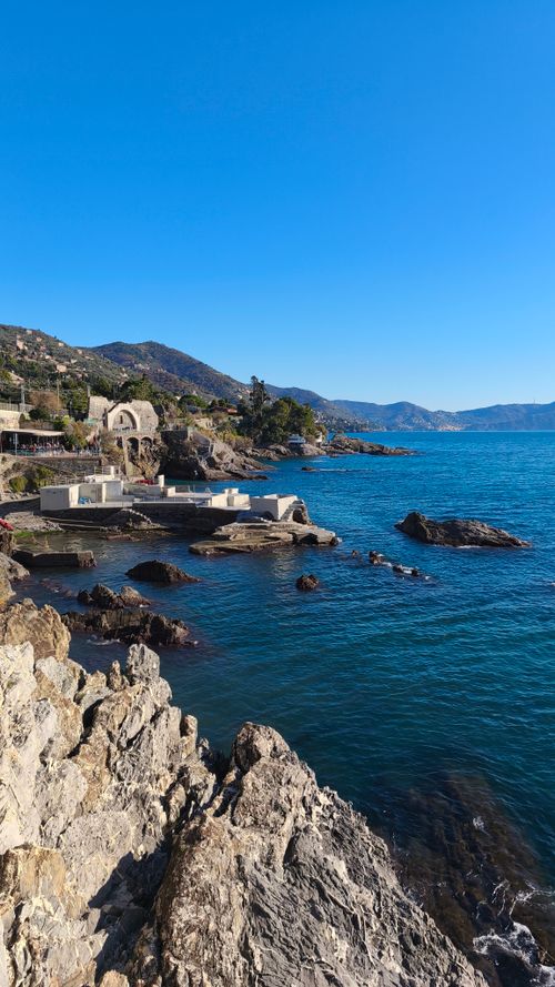 Free Beautiful coastal landscape of Italy with rocky shores and clear blue waters. Stock Photo